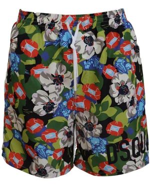 Dolce & Gabbana Blumige badeshorts mit logo-print - Grün