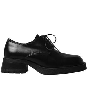 Miista Zwarte Platte Schoenen Althea Brogues