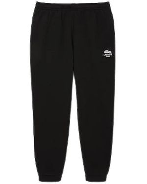 Lacoste Pantaloni Tuta - Zwart