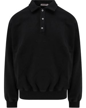 ih nom uh nit Polo Shirts - Black