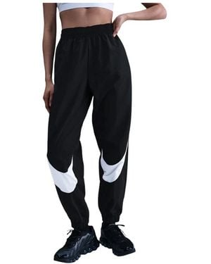 Nike Fitness ,Zwart ,Nylon Sportswear Mid-Rise Loose Fit Hardloopbroek