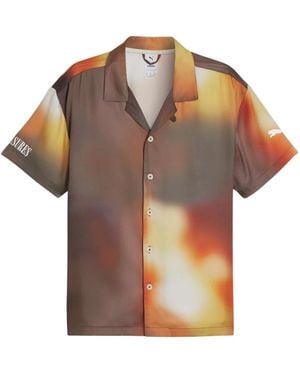 PUMA Short Sleeve Shirts - Marrone