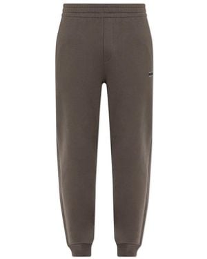 Moncler Broeken ,Bruin ,Katoen Trainingsbroeken Met Gedrukt Logo - Grijs
