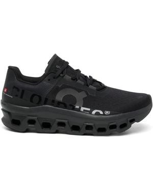 On Shoes Schwarze mesh low-top sneakers