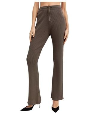 Nanushka Pantaloni a righe in maglia taglio classico - Marrone