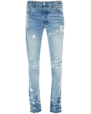 Amiri Lichtblauwe Ripped Jeans Knoopsluiting