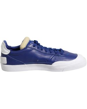 Nike Blau Weiße Ledersneakers Gummisohle