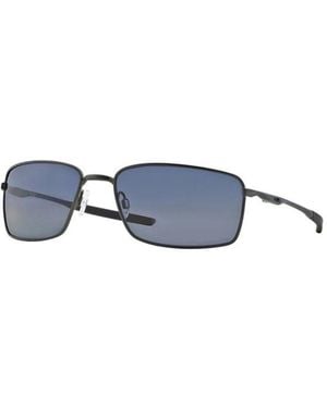 Oakley Schwarze stilvolle sonnenbrille für trendigen look - Blau