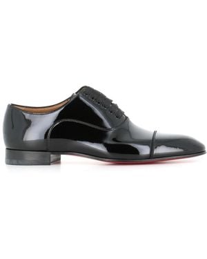 Christian Louboutin Schwarze Oxford Flache Schuhe Lackleder