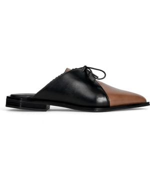 LE BOHÉMIEN Mules - Black