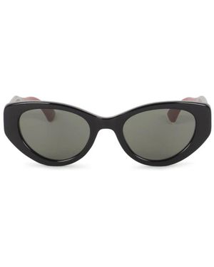 Gucci Accessoires ,Zwart ,Gg 1862S Zonnebril - Grijs