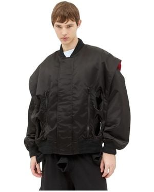 Walter Van Beirendonck Glänzende tunnel bomberjacke - Schwarz