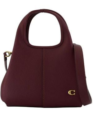 COACH Handbags - Morado
