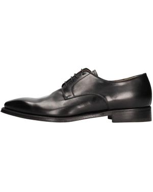 Neil Barrett Flache Schuhe Schwarz - Braun
