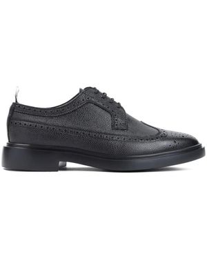 Thom Browne Schwarze stiefeletten brogues - Blau