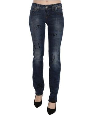 John Galliano Pantaloni denim skinny con stampa di giornale blu