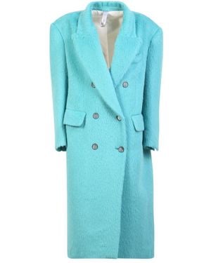 Hevò A tailored double-breasted coat by Hevò. The brand tells an Apulian story under the influence of evolution and evocation - Blau