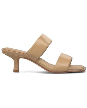 Alma En Pena. Heeled Mules - White