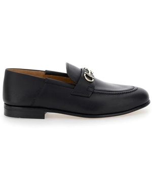 Ferragamo Schwarze lederslipper mit gancini-detail