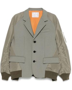 Sacai Grüne knopfjacke mit kordelzug in der taille