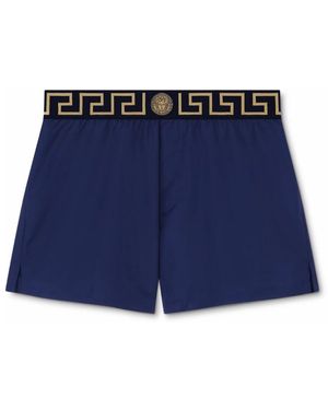 Versace Blaue badehose mit greca-borte