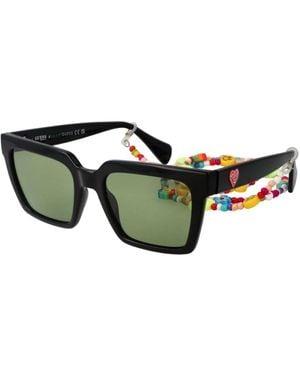 Guess Schwarze Sonnenbrille Grüne Gläser