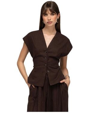 GUAJA. Vests - Nero
