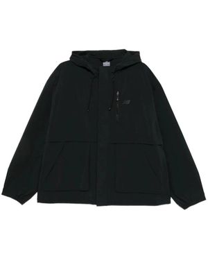 New Balance Light Jackets - Negro
