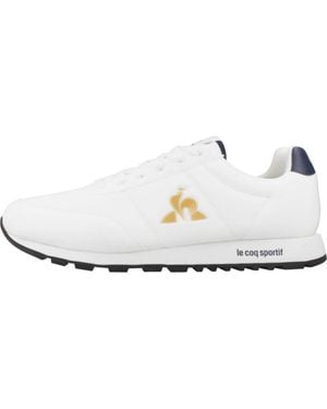 Le Coq Sportif Moderne Weiße Sneakers Mit Goldenen Details