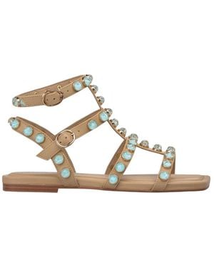 Alma En Pena. Flat Sandals - Metallic