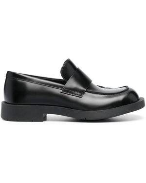 Camper Schwarze Lederslip-On-Flatschuhe