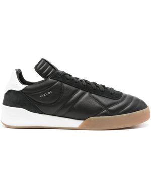 Courreges Schwarze matelassé sneakers