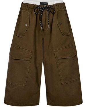 Haute L'Amitié Lange Shorts - Groen