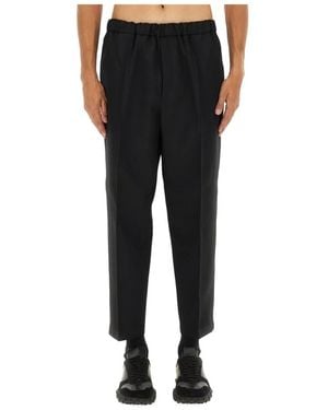 Jil Sander Broeken ,Zwart ,Relaxed Fit Plissã Broek
