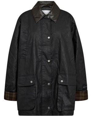 Haute L'Amitié Rain Jackets - Schwarz