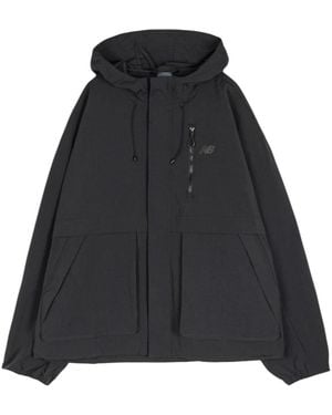 New Balance Light Jackets - Negro