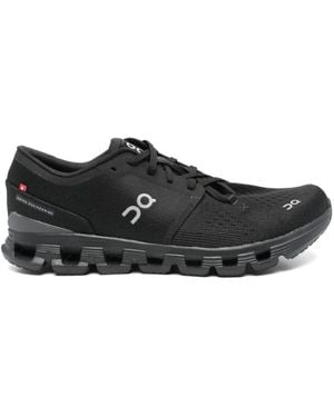 On Shoes Schwarze Gestrickte Sneakers Mit Speedboard Plate