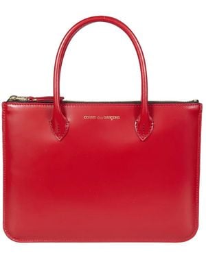 Comme des Garçons Tote Bags - Rojo