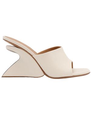 Off-White c/o Virgil Abloh Mule in pelle con zeppa scultorea - Bianco