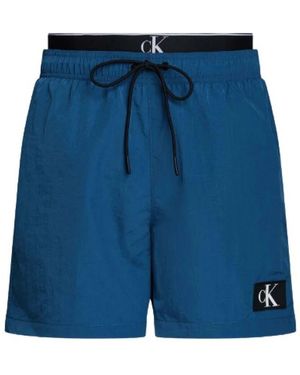 Calvin Klein Meereskleidung Bademode Doppelter Taillenbund - Blau