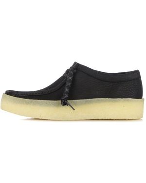 Clarks Schwarzer nubuk mokassin lifestyle schuh