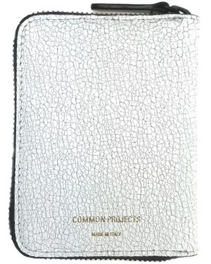 Common Projects Rissiges leder weiße münzschachtel