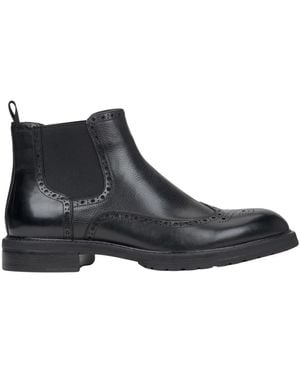 ESTRO Schwarze leder chelsea boots mit folk-perforation