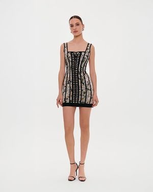 Millà Alluring Floral Mini Dress With Bold Lace-Up Hook - White