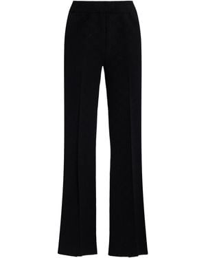 High Sport Long Kick Flared Stretch-cotton Knit Trousers - Black