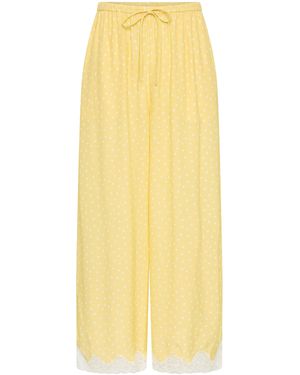 ROAME. Blake Mid-Rise Wide-Leg Lace-Trimmed Cropped Pants - Yellow