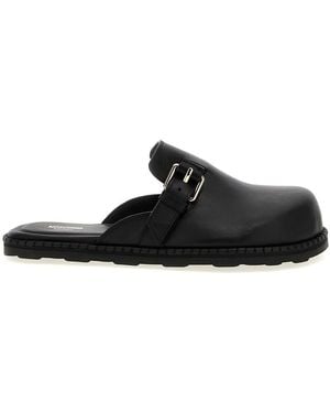 Moschino 'Birky' Sabots - Black