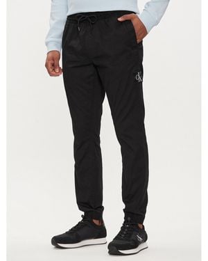 Calvin Klein Joggers Badge J30J325114 Skinny Fit - Schwarz