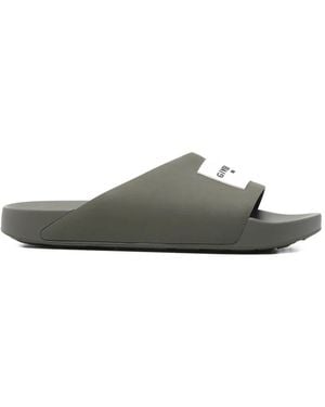 Givenchy Label Slide Flat Mules In Rubber - Gray