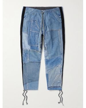 Greg Lauren Schmal zulaufende verkürzte Patchwork-Jeans mit Fransen - Blau
